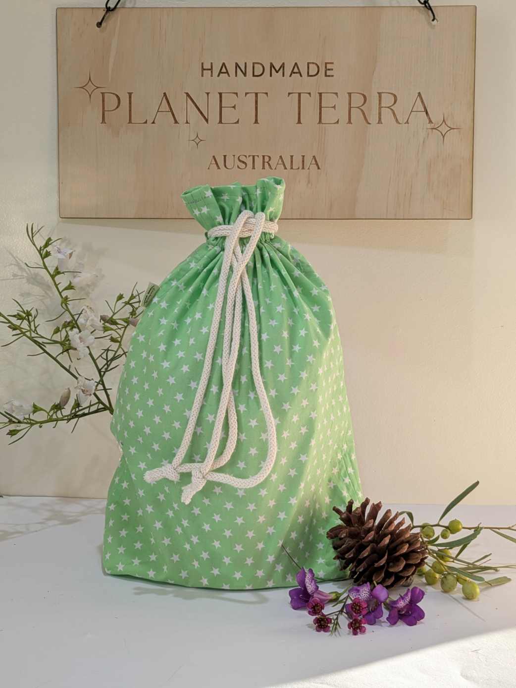 Christmas Reusable Fabric Gift Bag with Drawstring Closure.