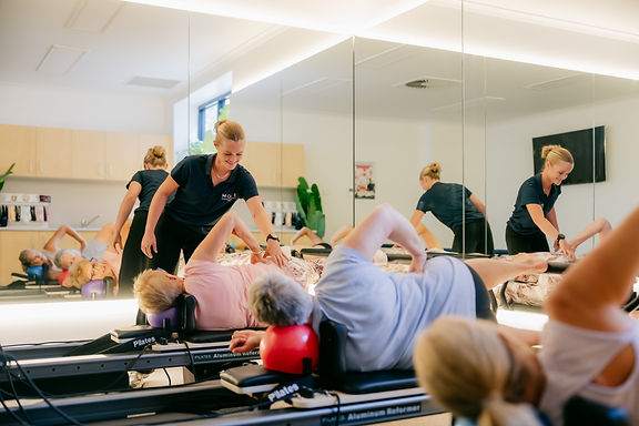 Reformer - Anna hands on support 2 (horizontal) .jpg