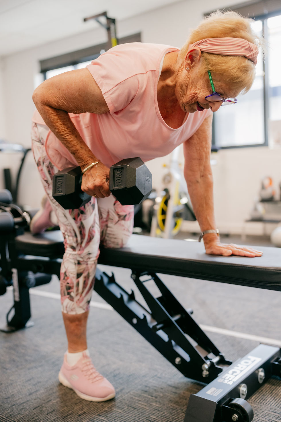 Woman in gym at Move Sports Physio Geelong doing strength training