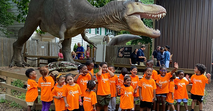 preschool field trip to cstl, children with dinosaur