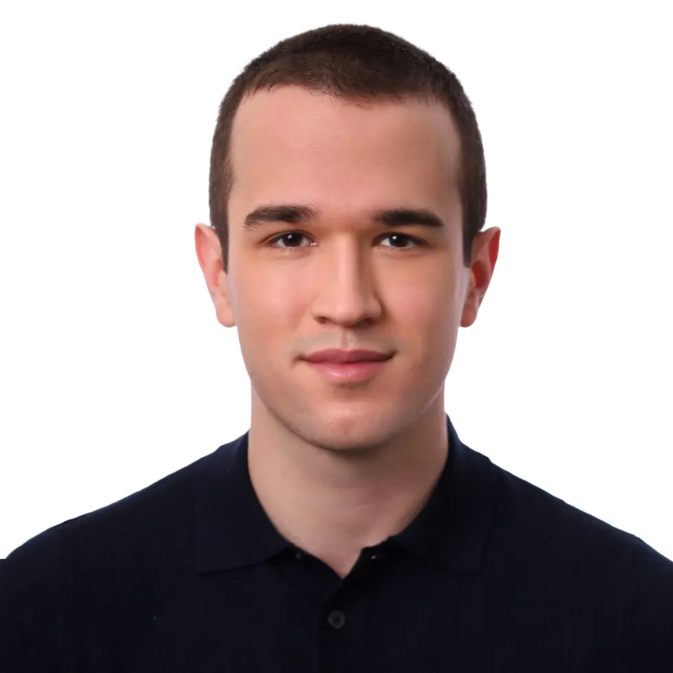 Cherkez Cherkesov, cinematographer, in a dark polo shirt against a plain background.
