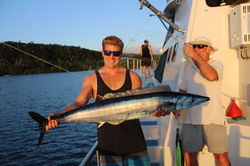 man holding wahoo
