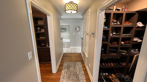 Separate closets in the Master Bedroom hallway