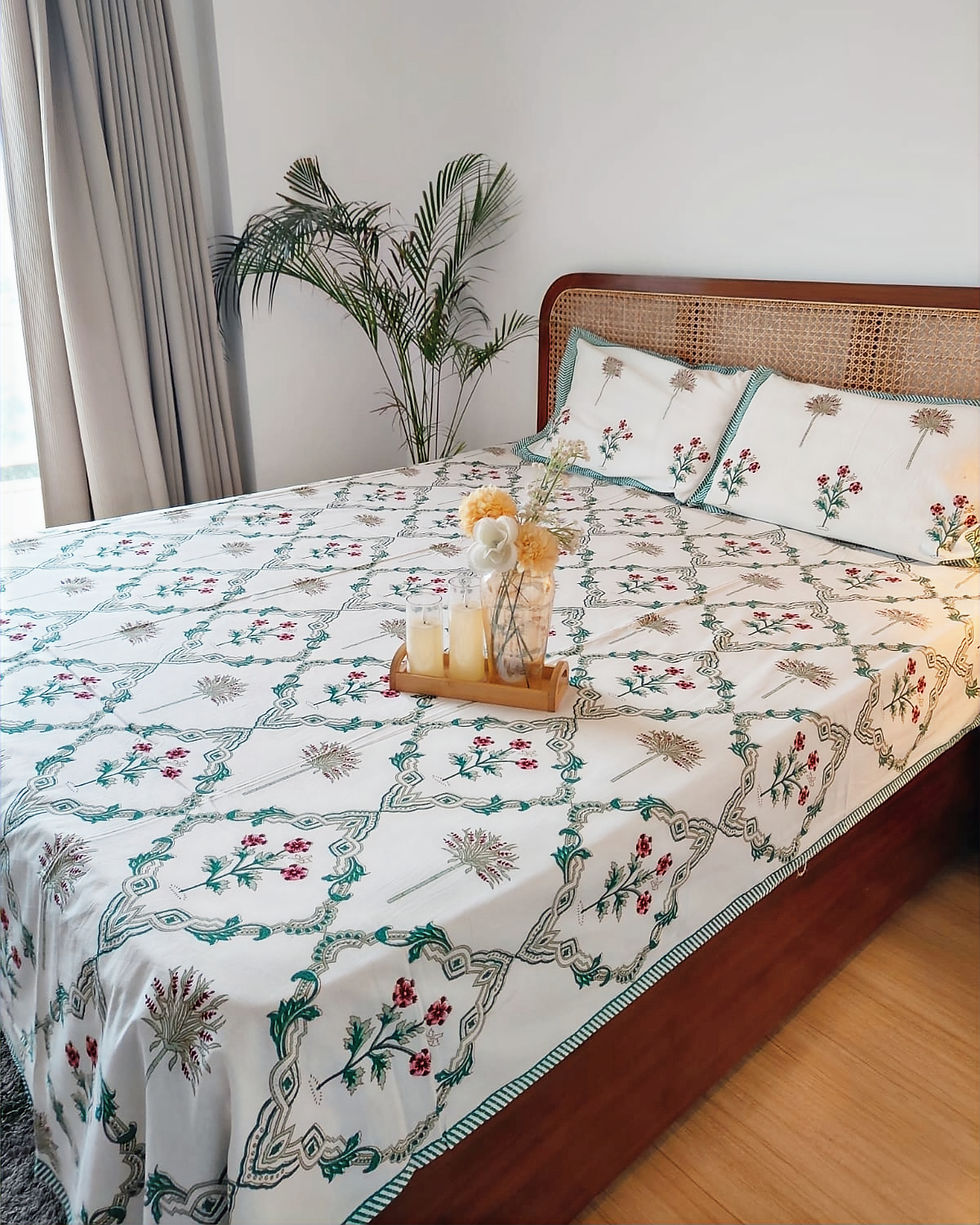 Premium pure soft cotton bedsheet with vines and floral motifs in green, pink and white
