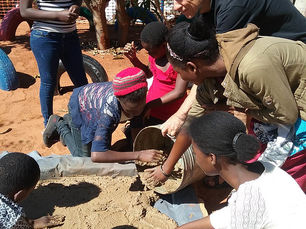 Russel Ford with Children in Africa