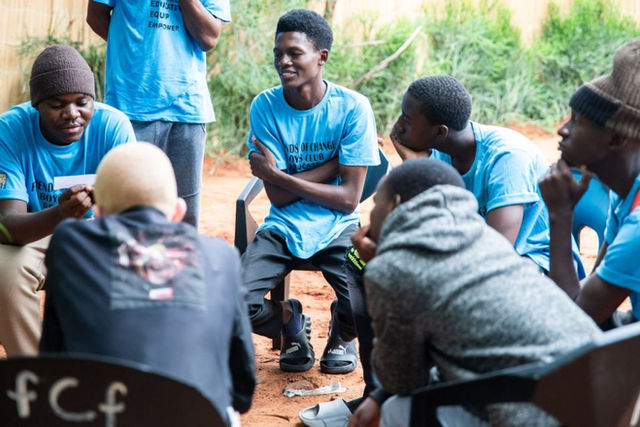 Group of boys in Friends of Change discuss topics around healthy and unhealthy relationships