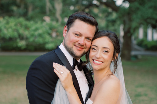 bride and groom under oak tres at new orleans wedding