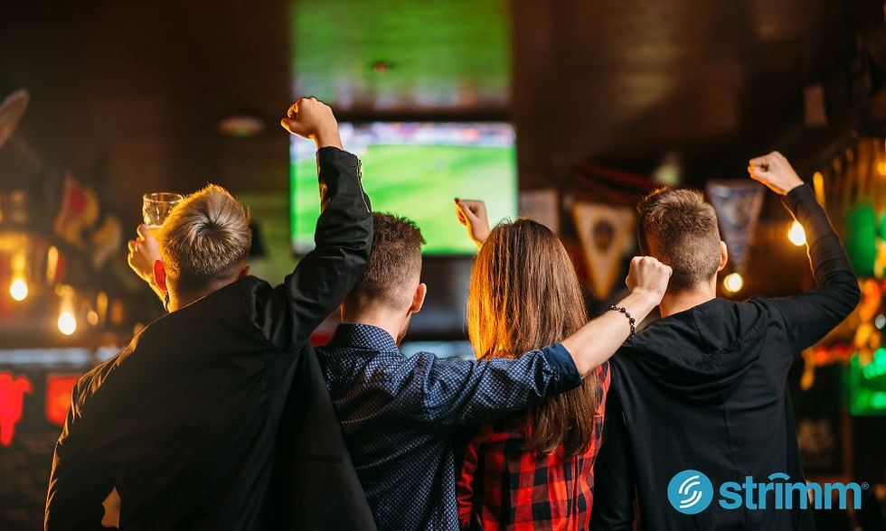 Four friends watching a niche sports event stream on a custom tv channel
