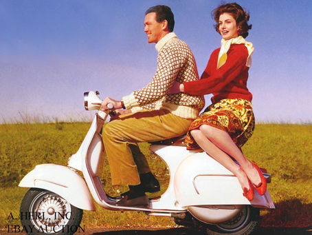a couple seated on a scooter