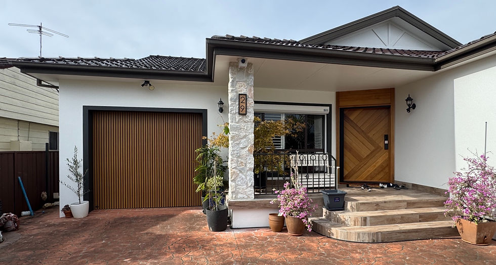 High angle view of a professional installing a custom garage door
