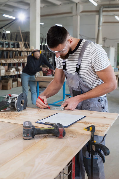 man-working-cutting-mdf-board.jpg
