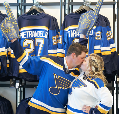Hockey St. Louis Missouri Cute Engagement Photo Shoot Ideas 2025 - 2026 Puck Engagement date kiss