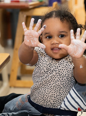Sariah finger painting.jpeg
