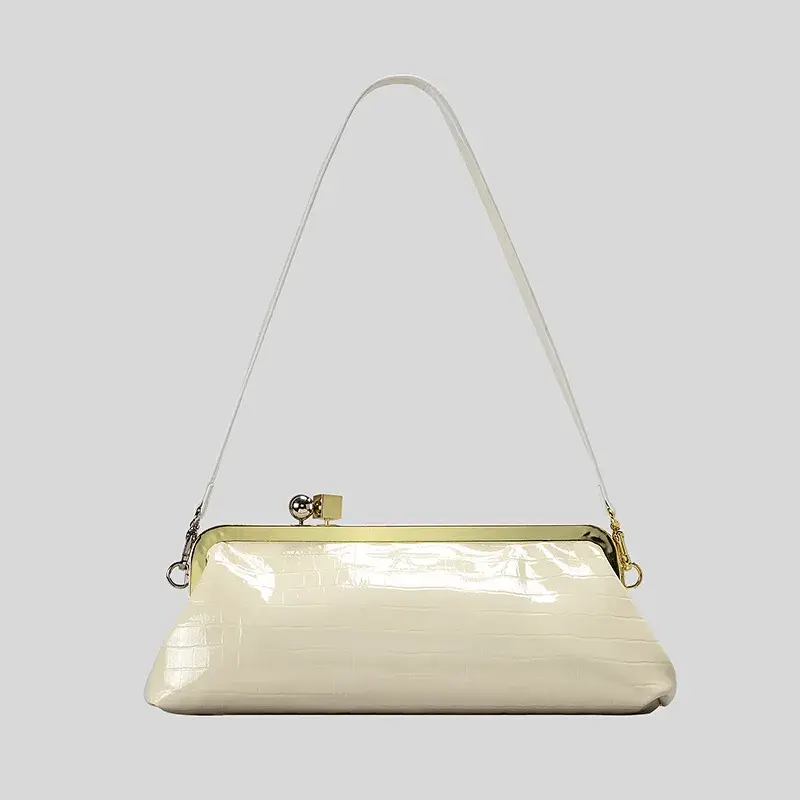 Thumbnail: The Allegra Trapeze Frame Clutch