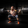 Strongman Doing Power Squat