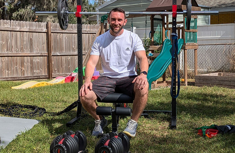 Mobile personal training set up with full equipment in clients backyard