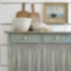 Duck egg gingham curtain with shabby chic cabinet and crockery