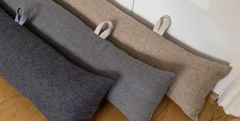 grey draught excluders with hoops.jpeg