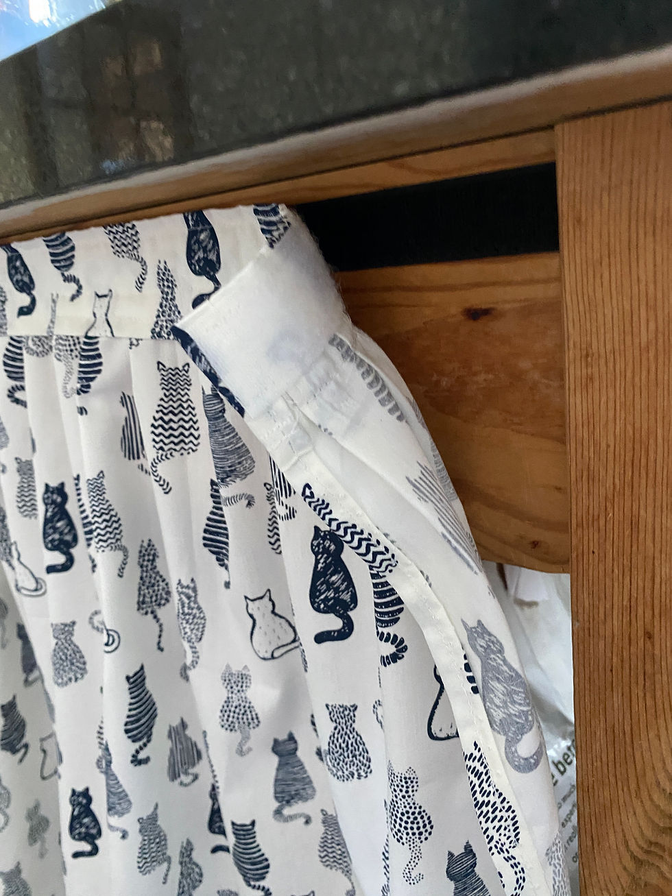 Close up of velcro system of Cats Print Sink skirt