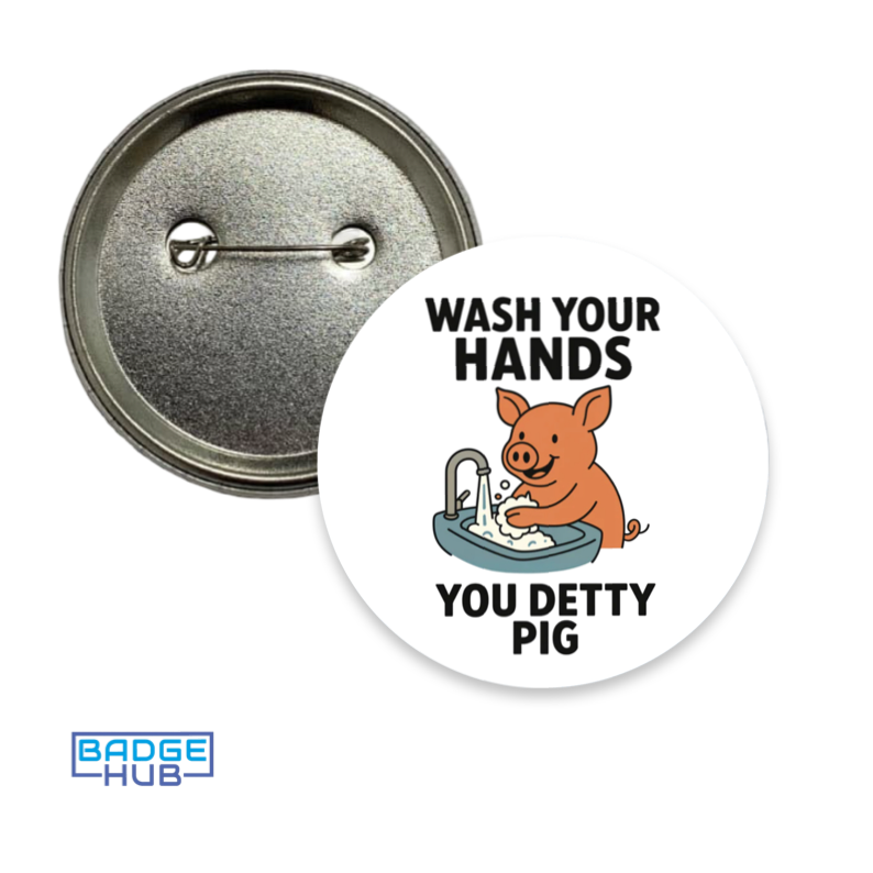 Humorous hygiene badge showing pig washing hands with “Wash your hands you detty pig” text