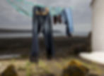 Animal jeans hanging up