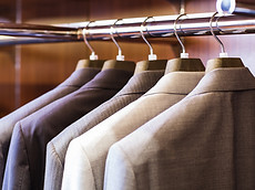 Suits hanging on a rack