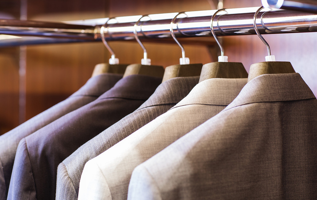 suits hanging on rack