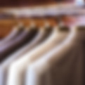 Suits hanging on a rack
