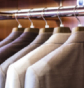 suits hanging on rack