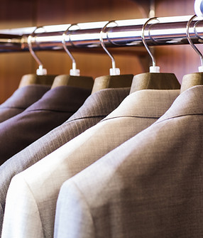 Suits hanging on a rack