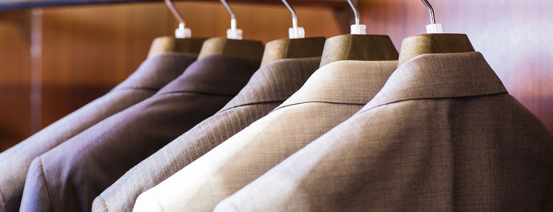 Suits hanging on a rack
