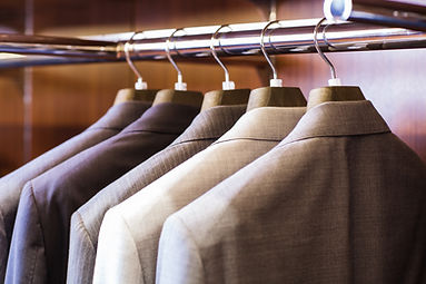 suits hanging on rack