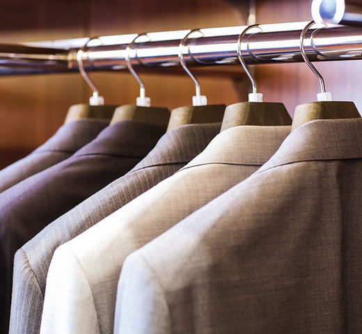 suits hanging on rack
