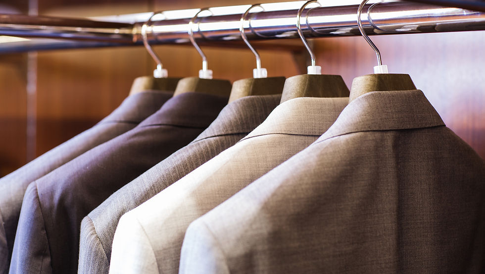 Suits hanging on a rack