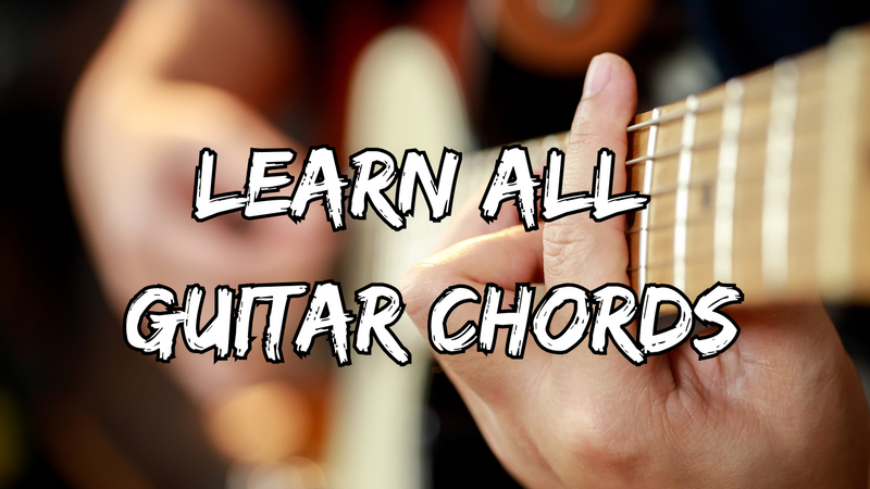 a man playing a guitar with the words learn all guitar chords step by step