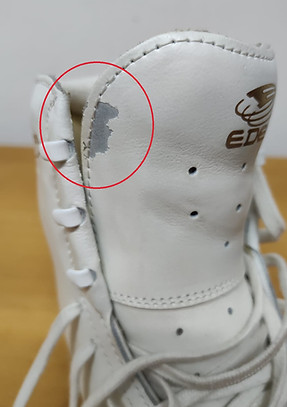 Desprendimiento de pintura en botas Edea