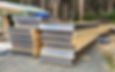 Stacked prefabricated OSB & Neopor SIPs roof panels ready for construction