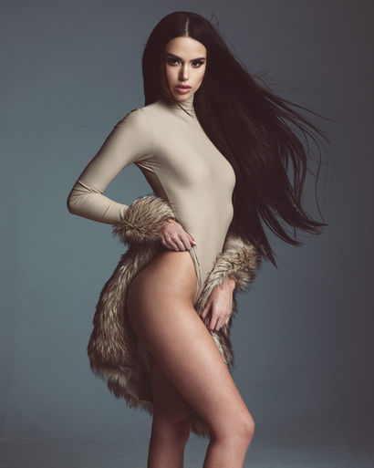 Fashion Commercial Editorial Photography of a model in bodysuit in studio by Los Angeles and Dallas tx photographer.