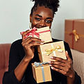 black woman with plain gift boxes.jpg