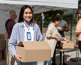 group-people-volunteering-foodbank-poor-people_23-2149012196.jpg