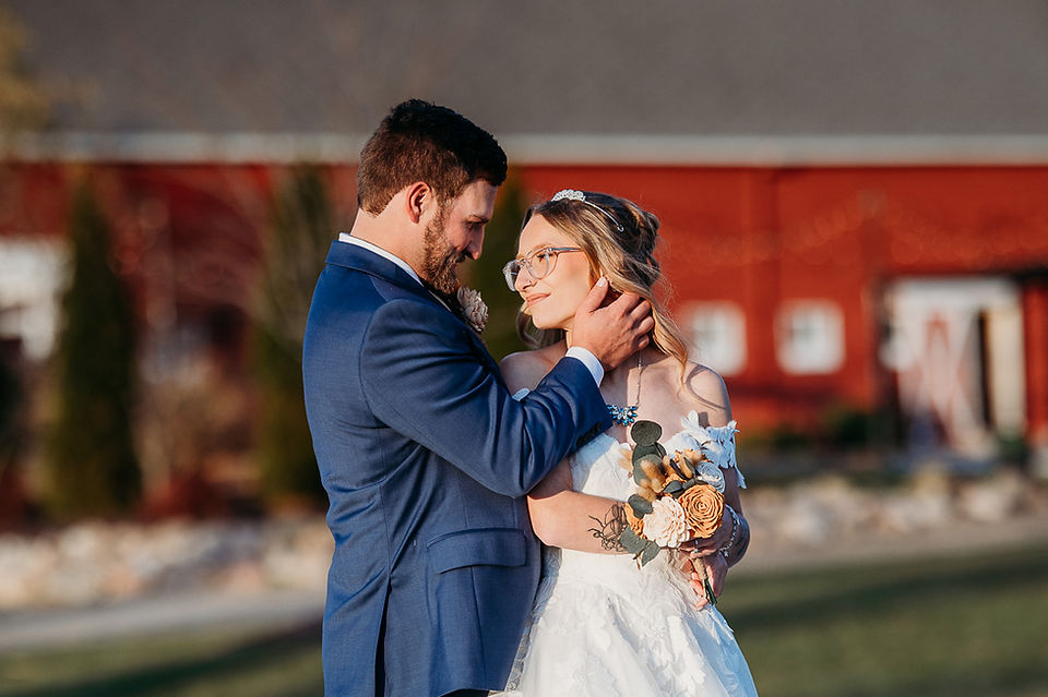 groom touching brides face