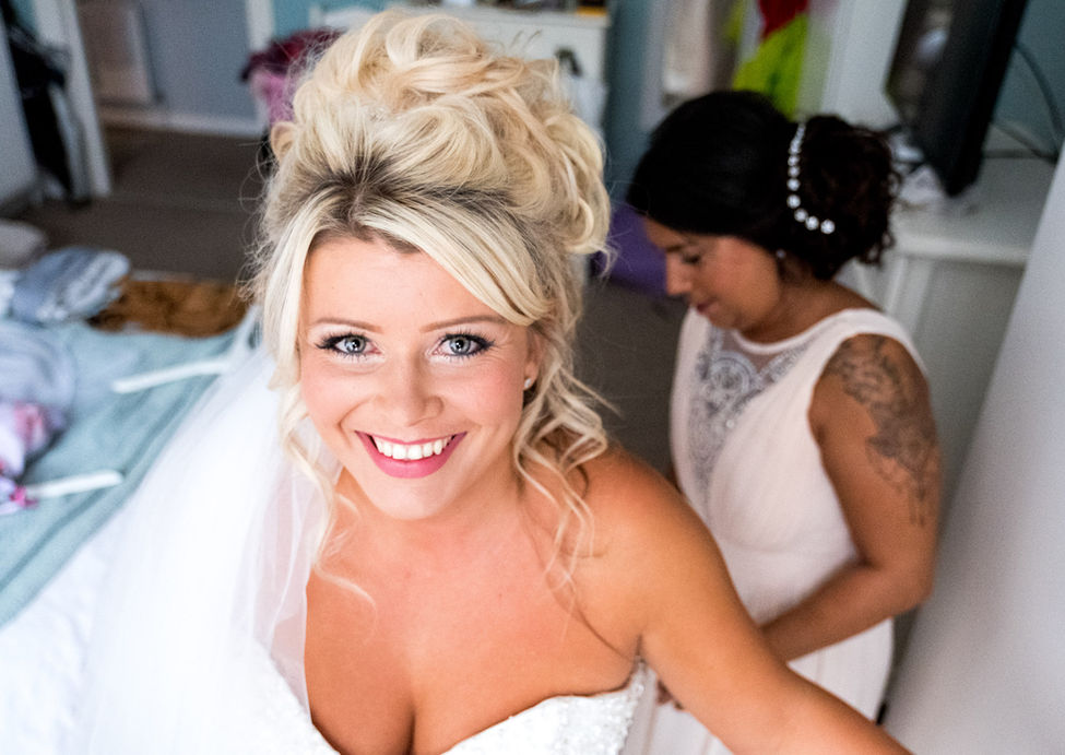 Bride smiling during bridal prep at Parley Manor wedding