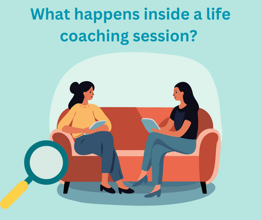 Two people sat on a sofa facing in each other in conversation.