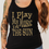 Thumbnail: Shine bright with our Sunshine Joker Toker Next Level Tank! ☀️🎸😎 Inspired by Steve Miller Band’s “Joker Smoker Midnight Tok