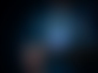 A person checks a smartwatch displaying colorful holographic health data, including a human diagram, against a dark background.