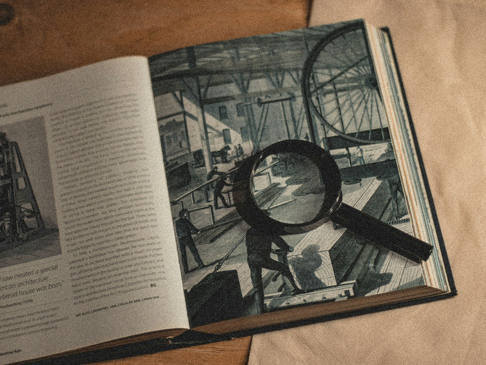 A magnifying glass over a book.