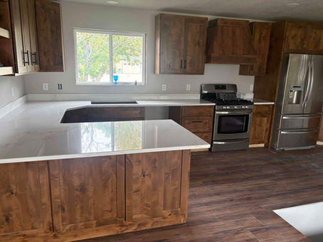 Solid Surface vs. Natural Stone: Which Works Best for Busy Kitchens?