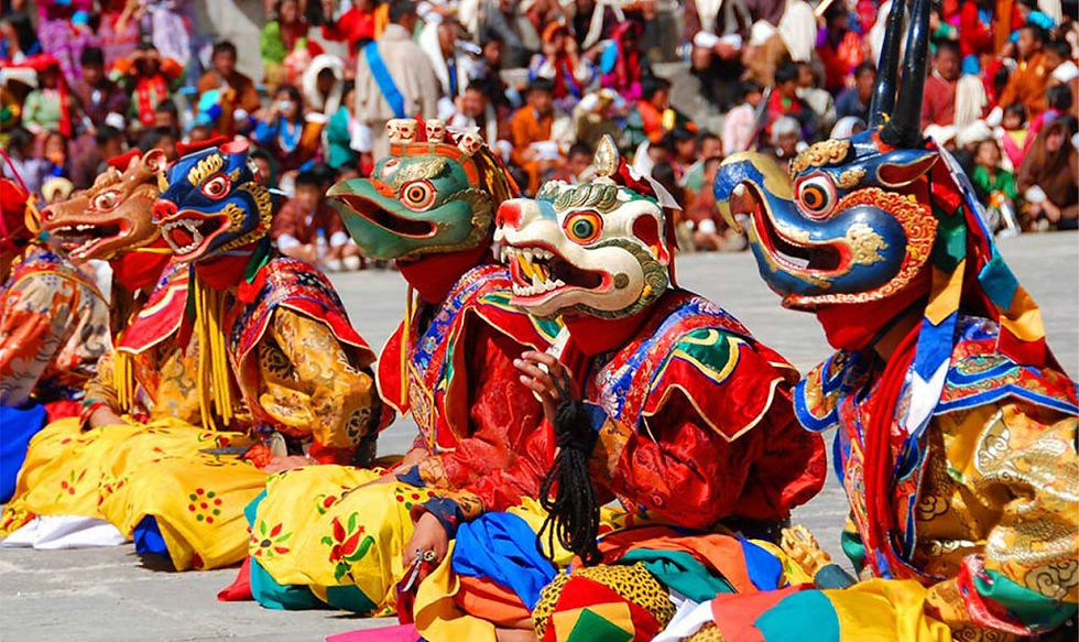 Vibrant Bhutanese Tshechu festival in 2026 at Paro Dzong, with monks in colorful robes and masks performing cham dances.