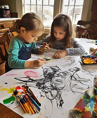 helping a child with art at the kitchen table.jpg