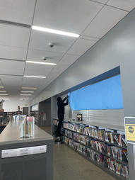 Teen parent at Oak Forest Library receiving free tutoring
